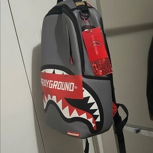 Sprayground Gray and Red Shark Mouth Backpack